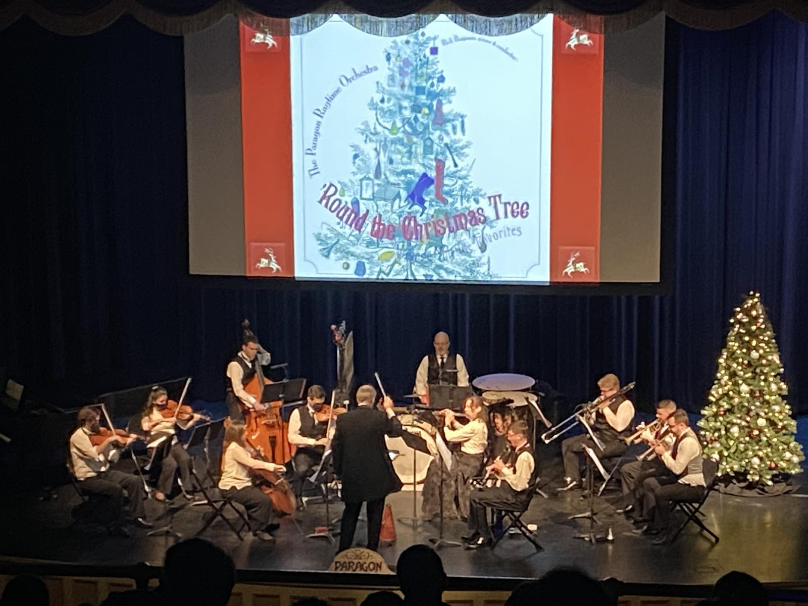 Paragon Ragtime Orchestra in Bettersworth Auditorium stage with musicians and conductor